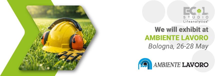 PPE laid out on a green lawn — a yellow helmet, gloves, and ear defenders — symbols of workplace health and safety, representing the upcoming May 2026 edition of Ambiente Lavoro, in which Ecol Studio’s EHS business unit will participate.